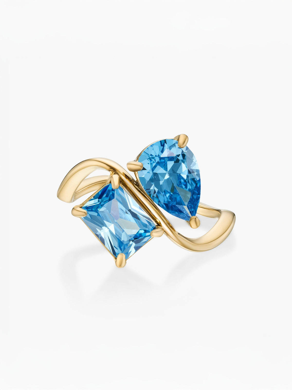 Anillo dos piedras Diciembre-Topacio azul (pera) y Diciembre-Topacio azul (rectángulo) dorado