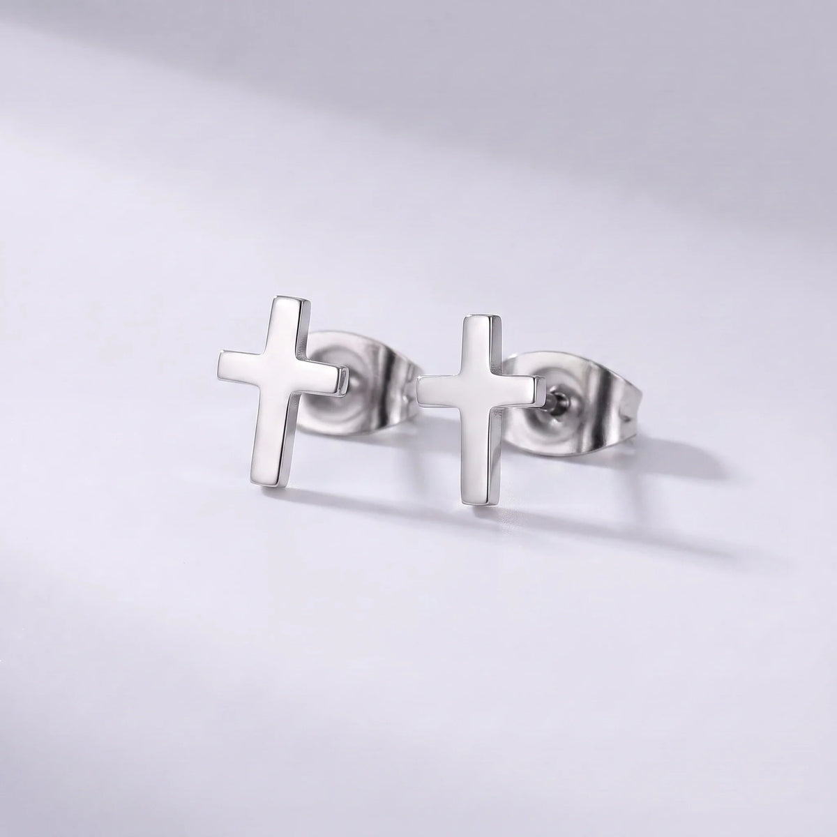 Pendientes cruz plateado