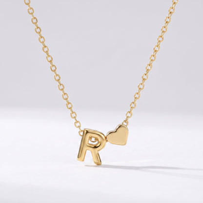 Collar letra R dorado con corazón, collar personalizado femenino en acero inoxidable resistente al agua.