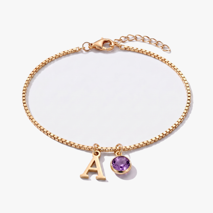 Pulsera letra A dorada con piedra de nacimiento Febrero — Amatista