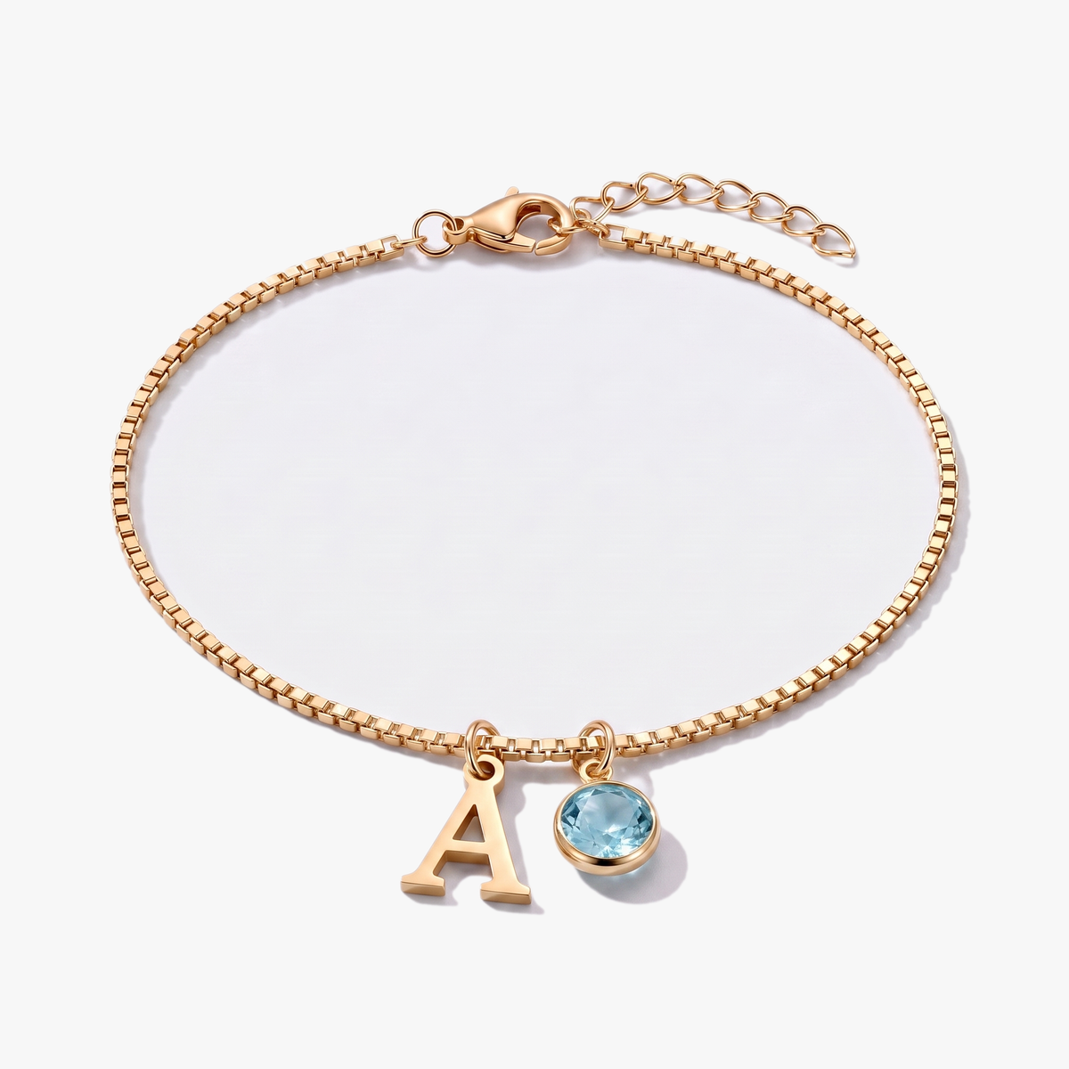 Pulsera letra A dorada con piedra de nacimiento Marzo — Aguamarina
