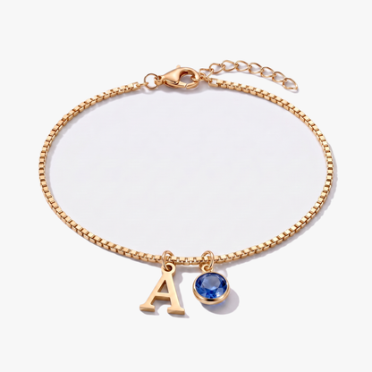Pulsera letra A dorada con piedra de nacimiento Septiembre — Zafiro
