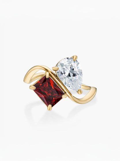 Anillo dos piedras Abril-Diamante (pera) y Enero-Granate (rectángulo) dorado