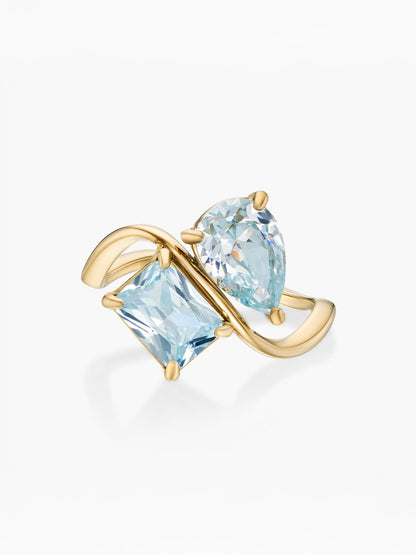 Anillo dos piedras Marzo-Aguamarina (pera) y Marzo-Aguamarina (rectángulo) dorado