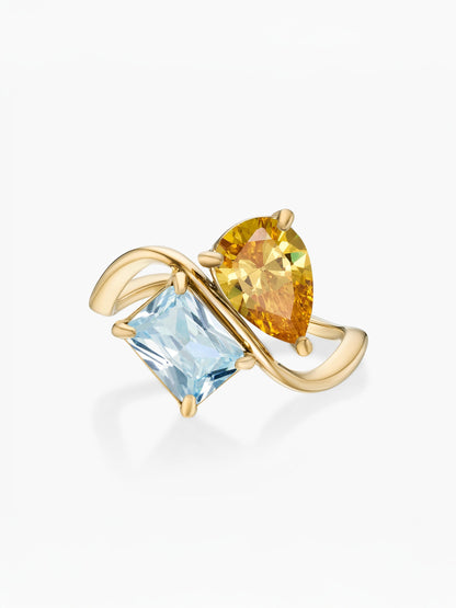 Anillo dos piedras Noviembre-Citrino (pera) y Marzo-Aguamarina (rectángulo) dorado