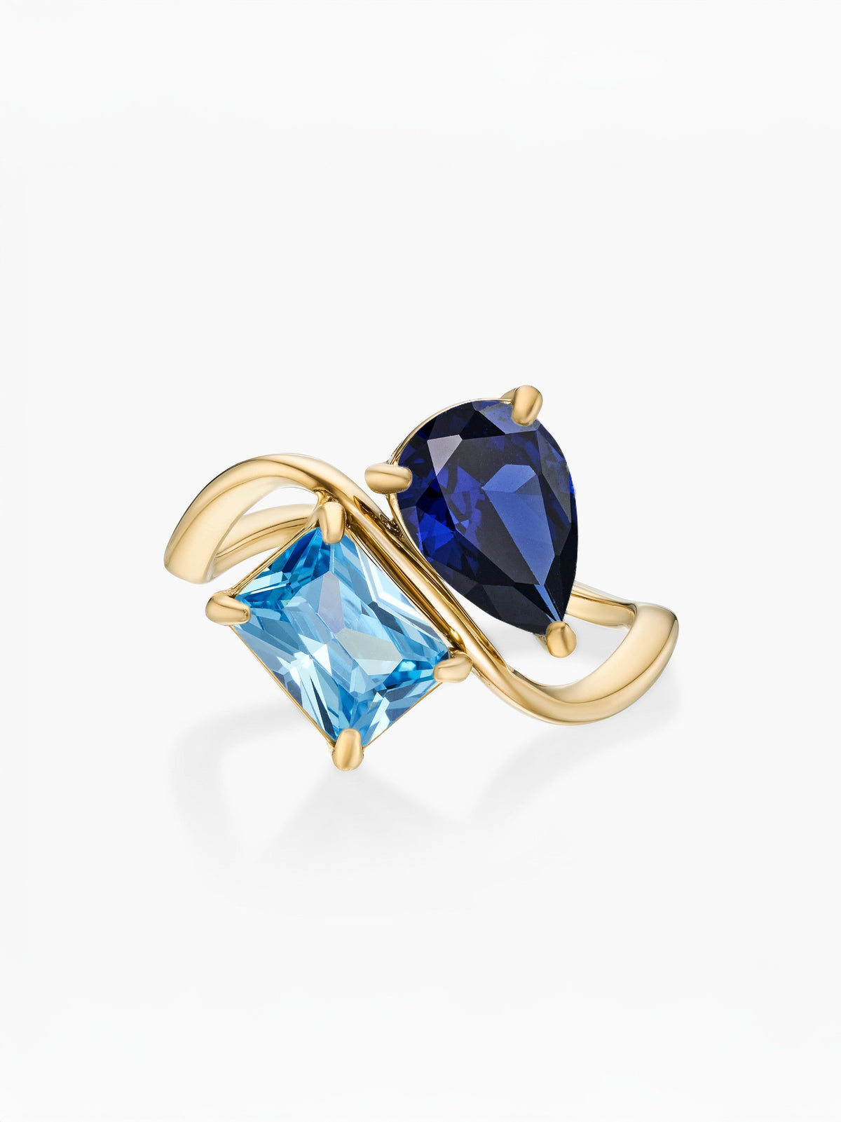 Anillo dos piedras Septiembre-Zafiro (pera) y Diciembre-Topacio azul (rectángulo) dorado