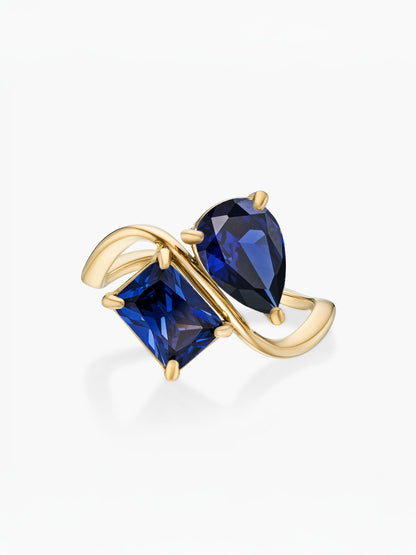 Anillo dos piedras Septiembre-Zafiro (pera) y Septiembre-Zafiro (rectángulo) dorado