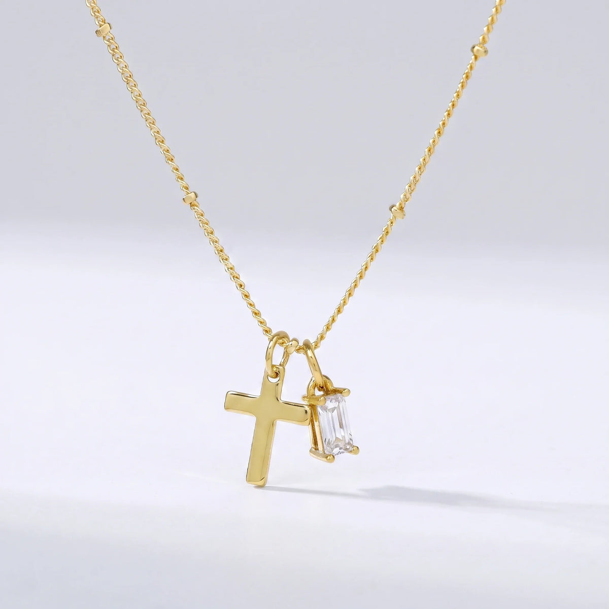 Collar cruz con piedra de nacimiento Abril — Diamante