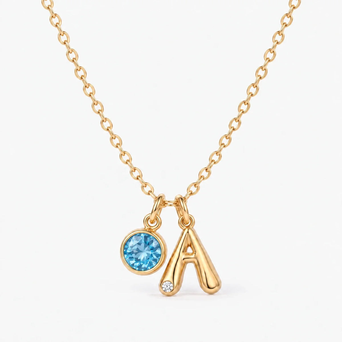 Collar Inicial A dorado — Diciembre — Topacio azul