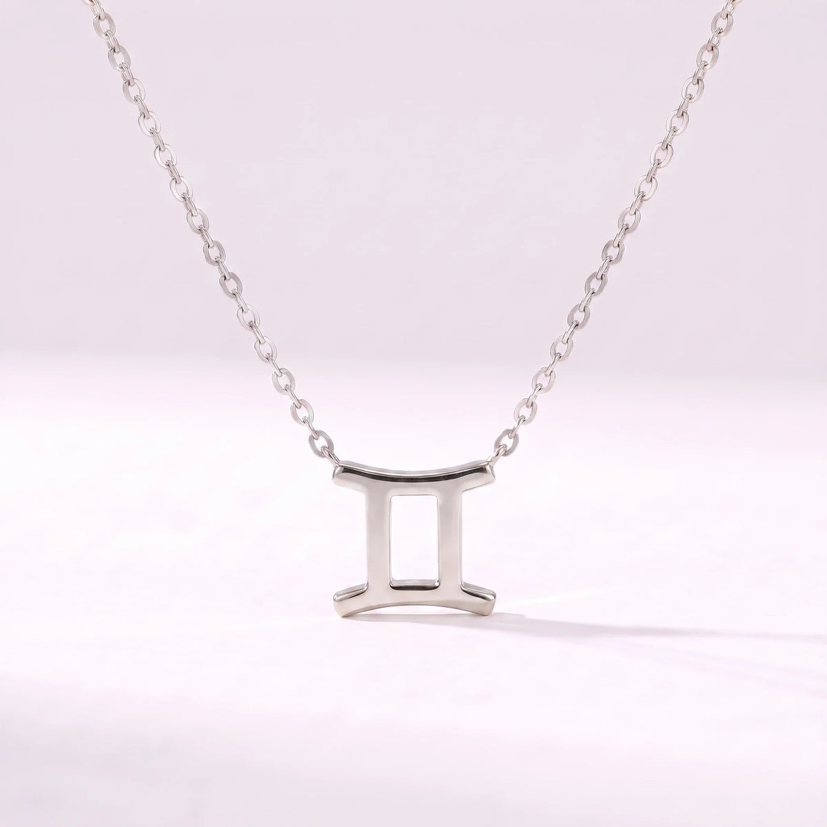 Collar símbolo del zodíaco Géminis plateado