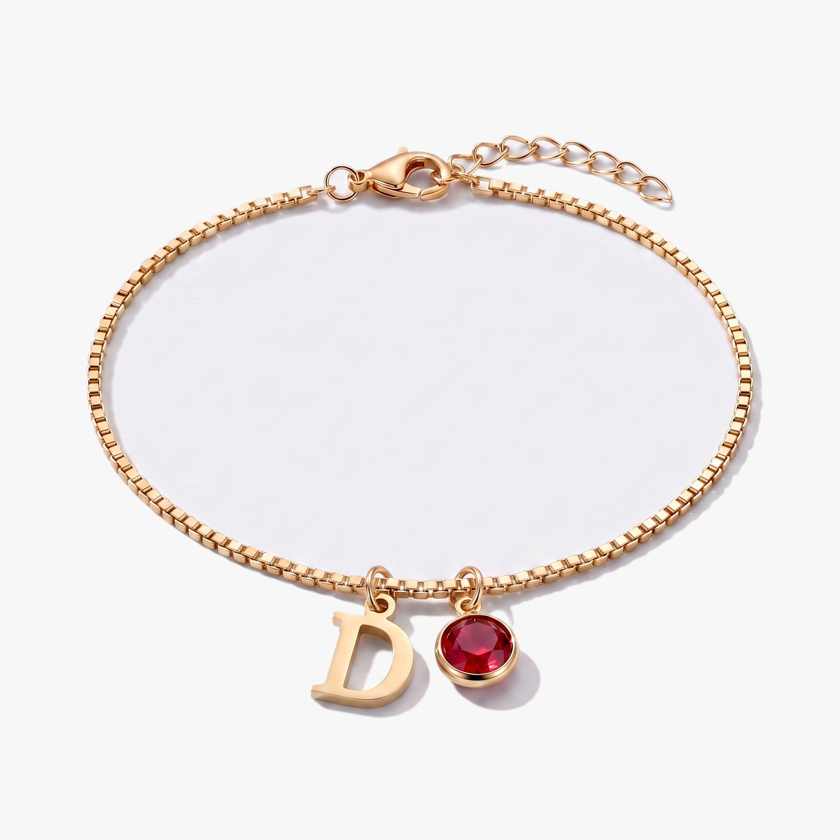 Pulsera letra D dorada con piedra de nacimiento Enero — Granate