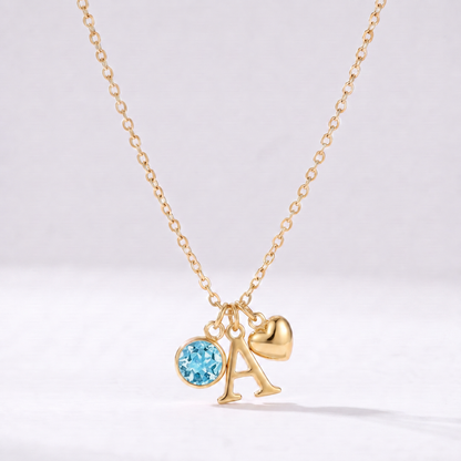 Collar letra A dorado con piedra de nacimiento Marzo — Aguamarina y coração