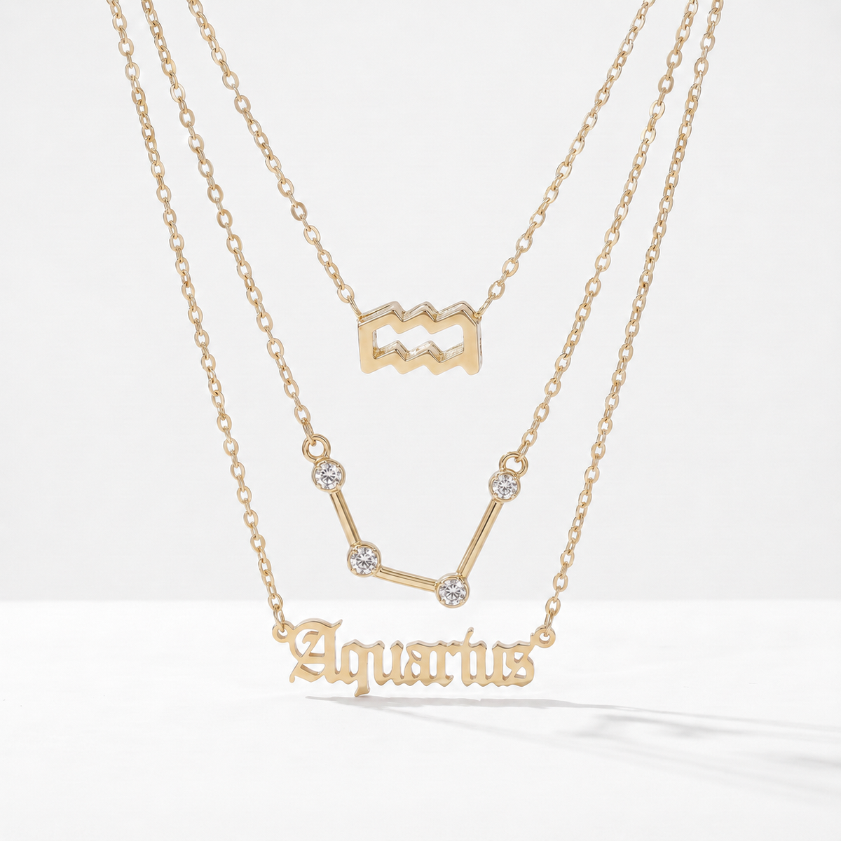 Conjunto 3 collares signo Acuario dorado