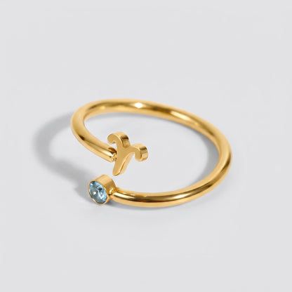 Anillo signo del zodiaco Aries dorado con piedra Aguamarina