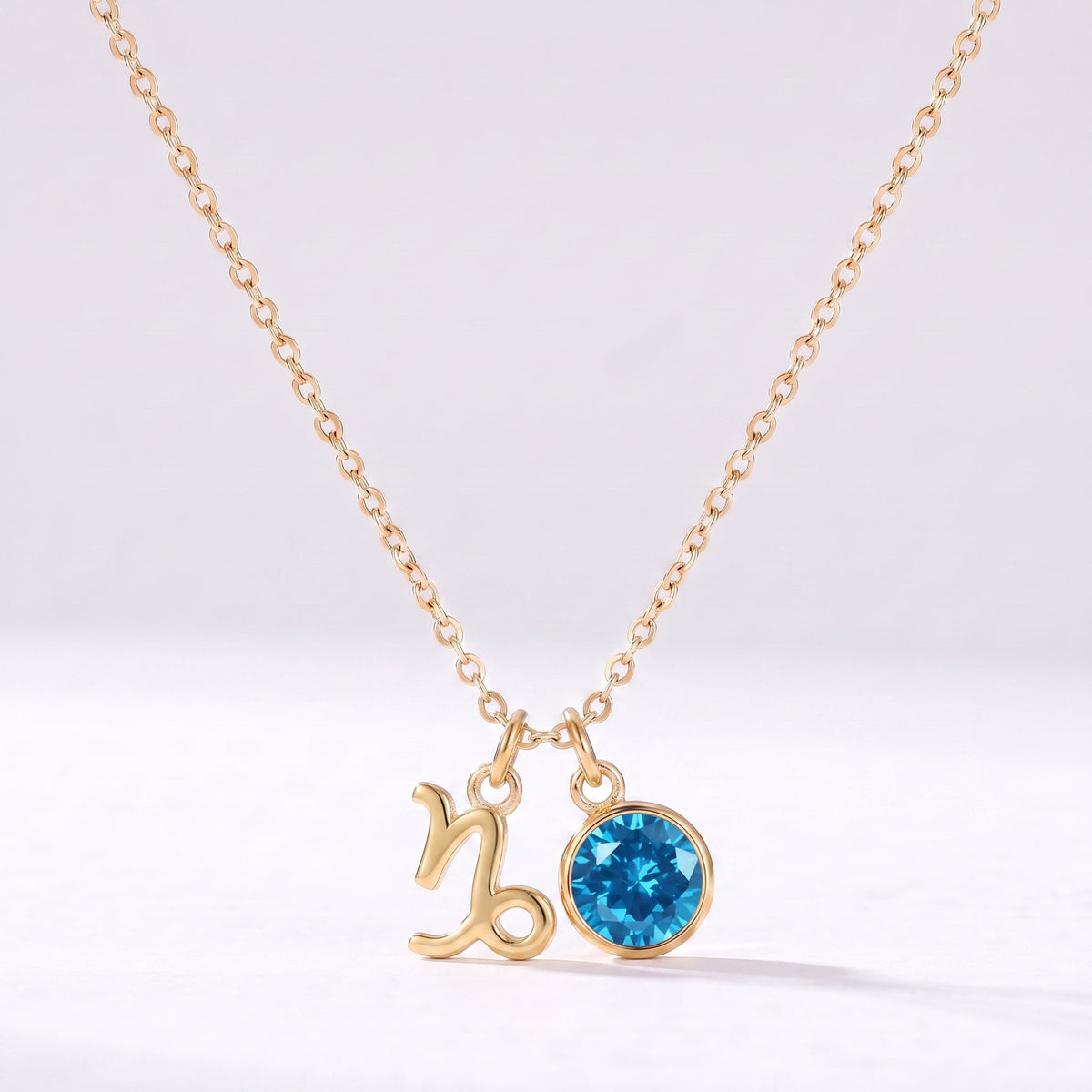 Collar signo del zodiaco Capricornio dorado con piedra de nacimiento Azul proveedor