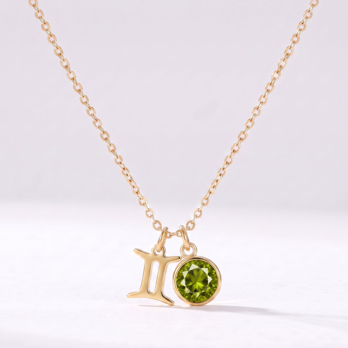 Collar signo del zodiaco Géminis dorado con piedra de nacimiento Peridoto