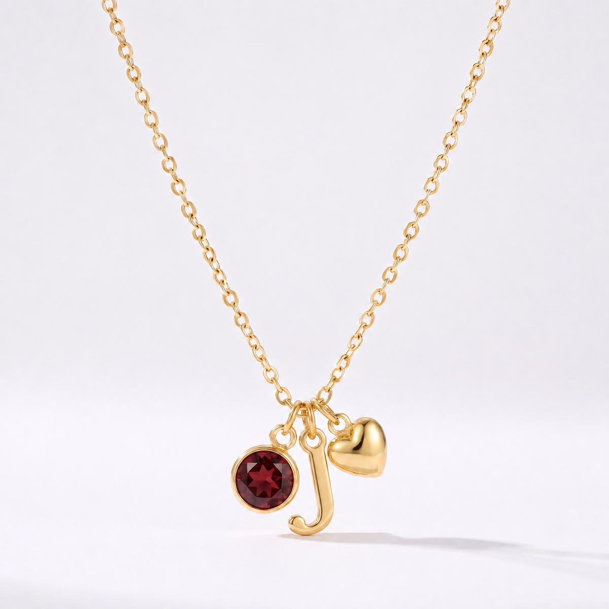 Collar letra J dorado con piedra de nacimiento y coração
