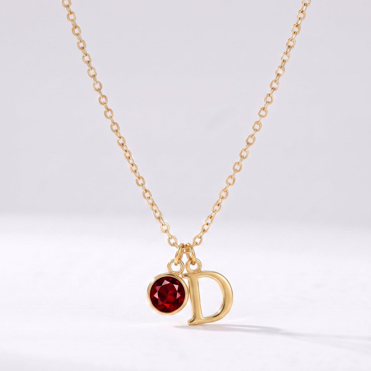 Collar letra D dorado con piedra de nacimiento