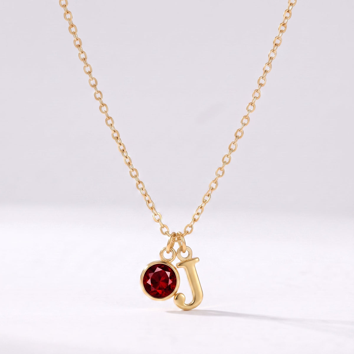Collar letra J dorado con piedra de nacimiento