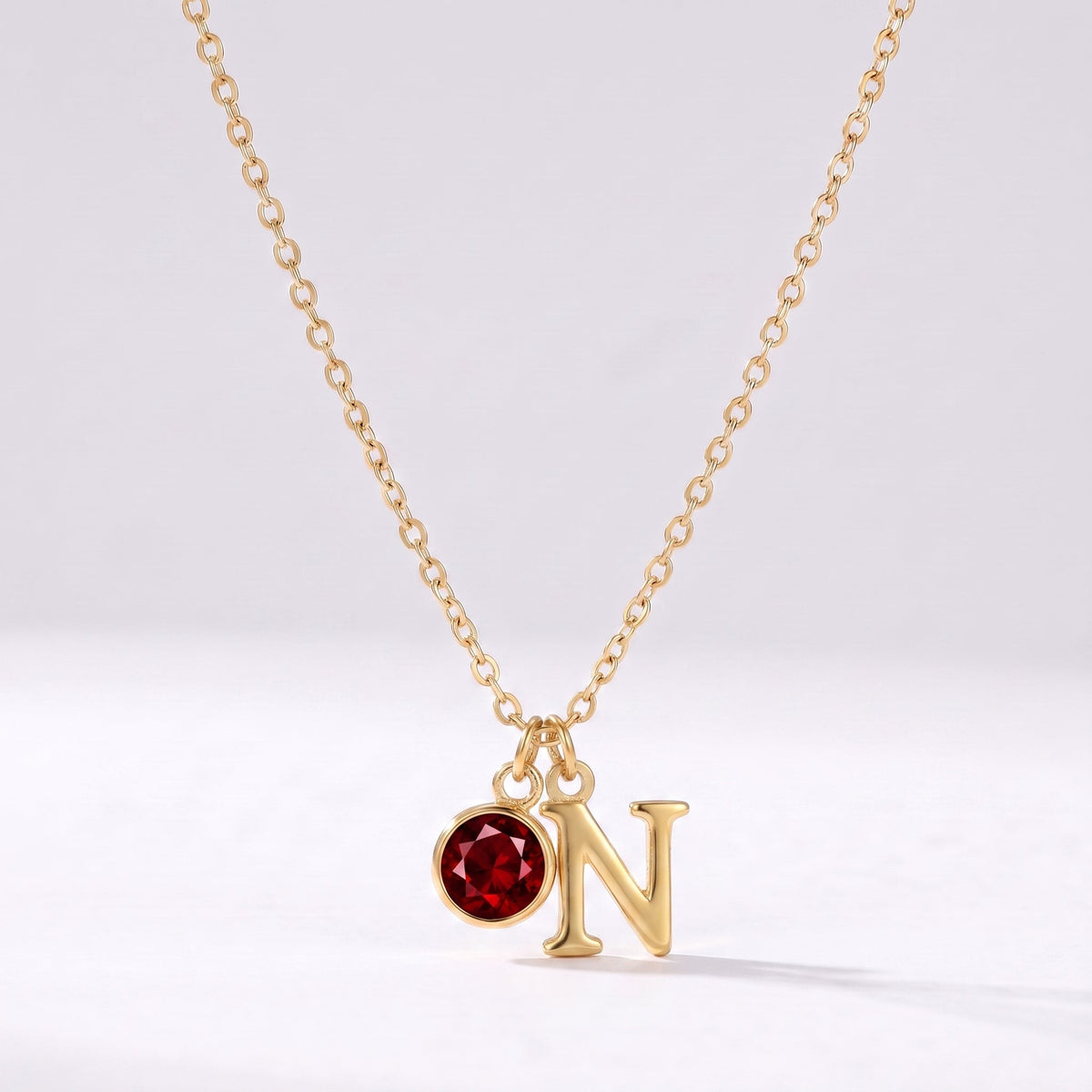 Collar letra N dorado con piedra de nacimiento