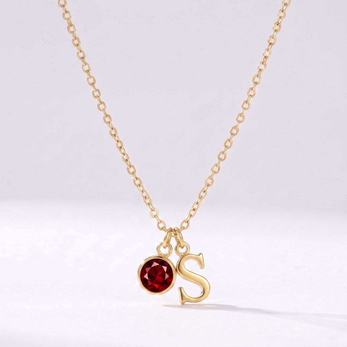 Collar letra S dorado con piedra de nacimiento