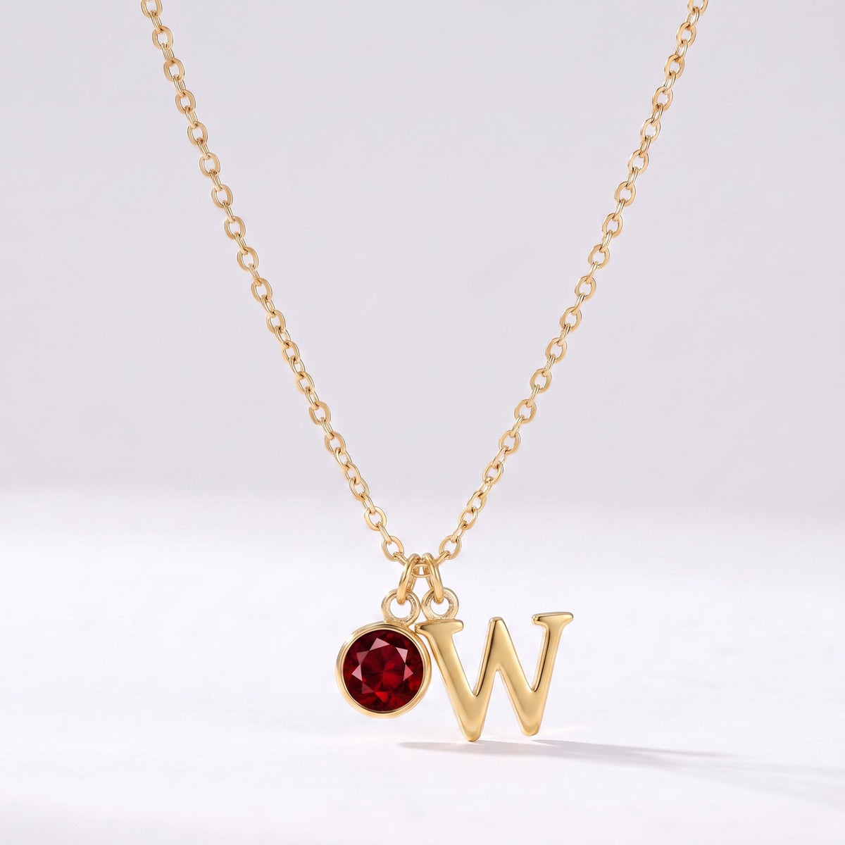 Collar letra W dorado con piedra de nacimiento