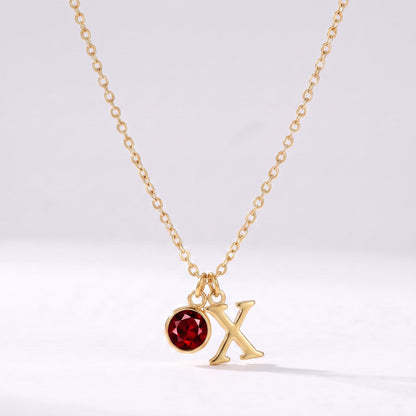 Collar letra X dorado con piedra de nacimiento