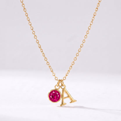 Collar letra A dorado con piedra de nacimiento Julio — Rubí