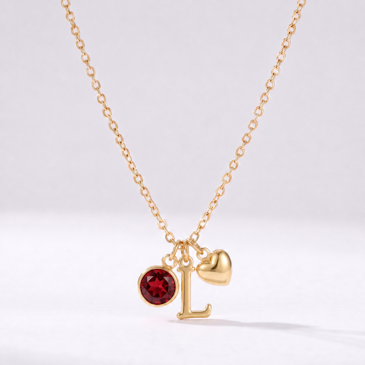Collar letra L dorado con piedra de nacimiento y coração
