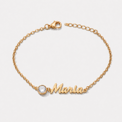 Pulsera con nombre y piedra de nacimiento dorada — Abril — Diamante, nombre Maria