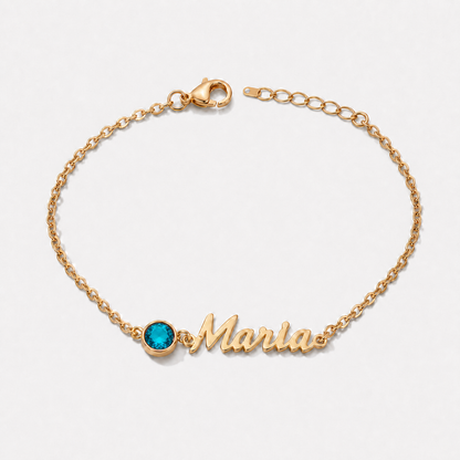Pulsera con nombre y piedra de nacimiento dorada — Diciembre — Topacio azul, nombre Maria