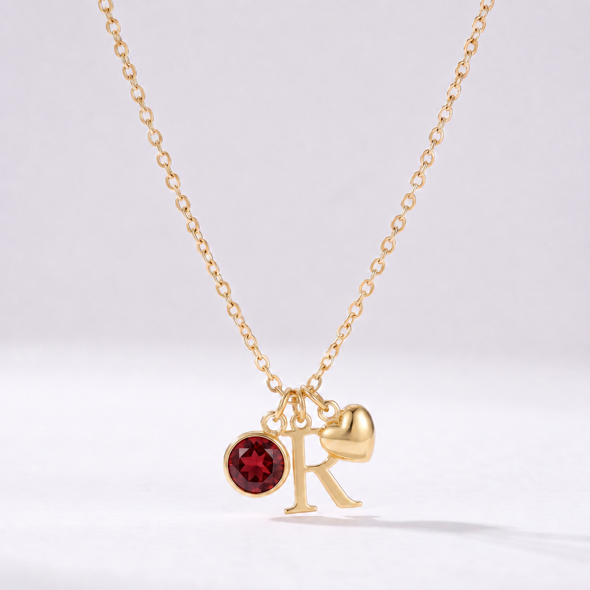 Collar letra R dorado con piedra de nacimiento y coração