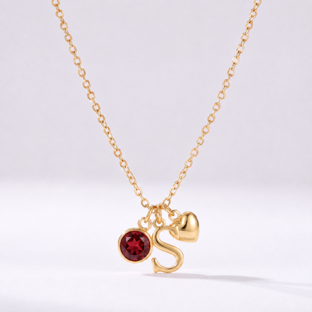 Collar letra S dorado con piedra de nacimiento y coração