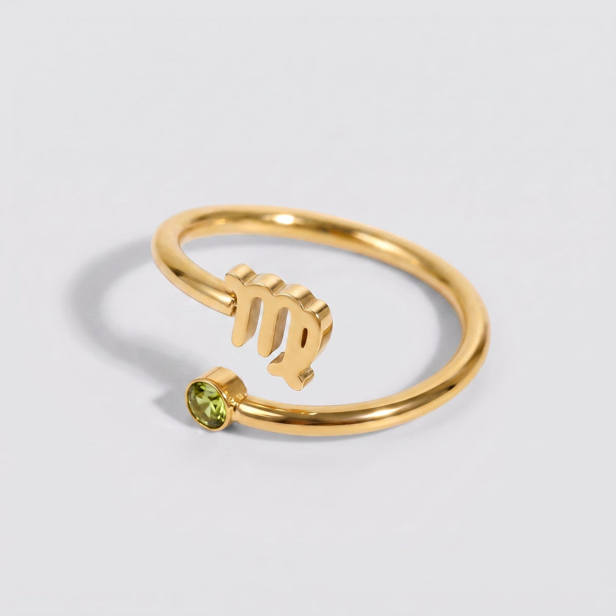 Anillo signo del zodiaco Virgo dorado con piedra Peridoto