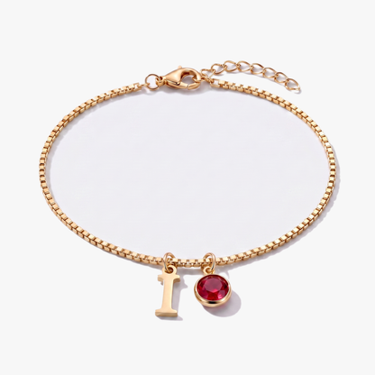 Pulsera letra I dorada con piedra de nacimiento Enero — Granate