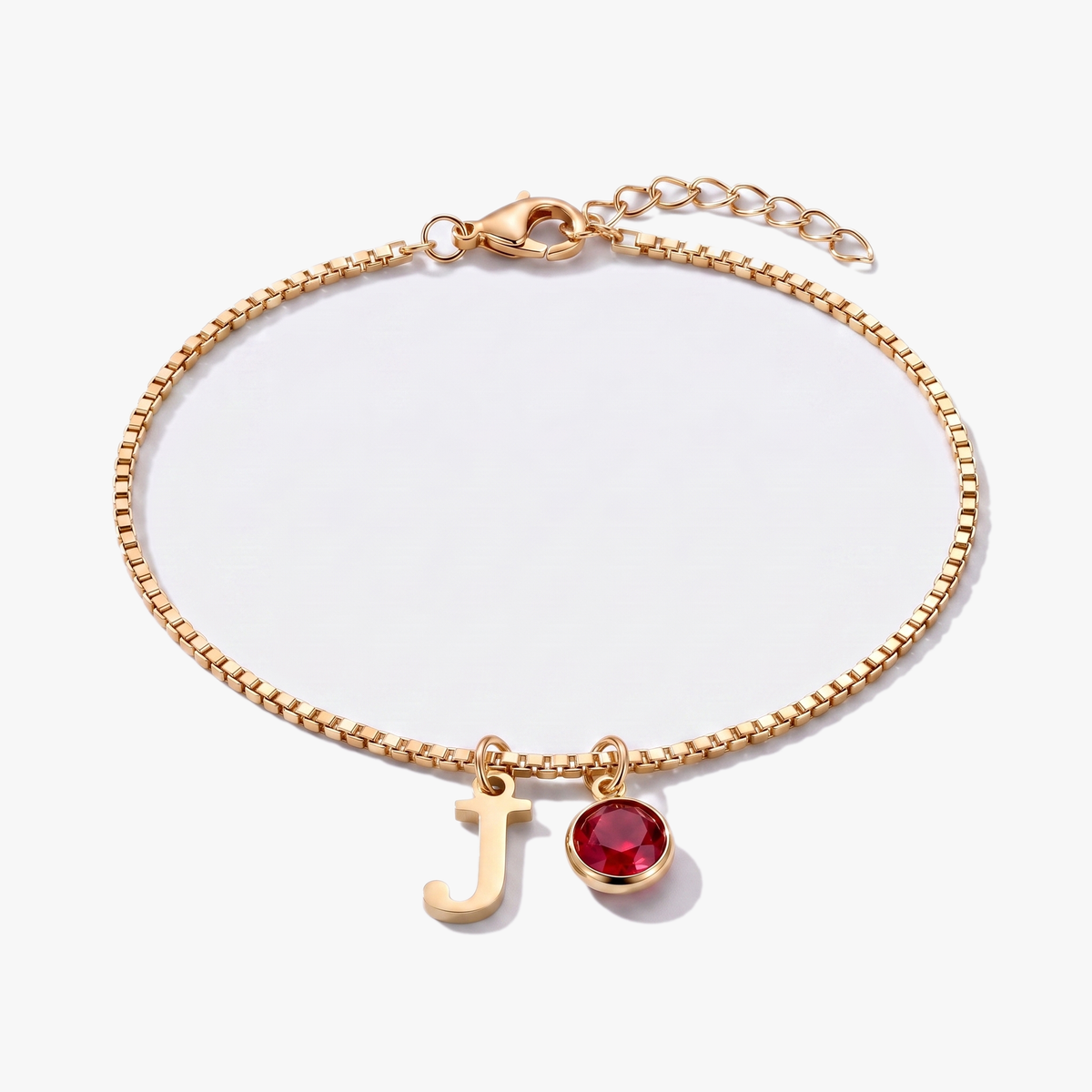 Pulsera letra J dorada con piedra de nacimiento Enero — Granate