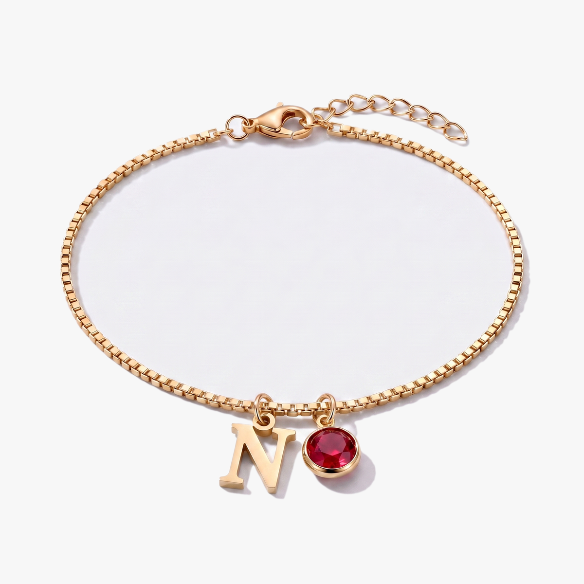 Pulsera letra N dorada con piedra de nacimiento Enero — Granate