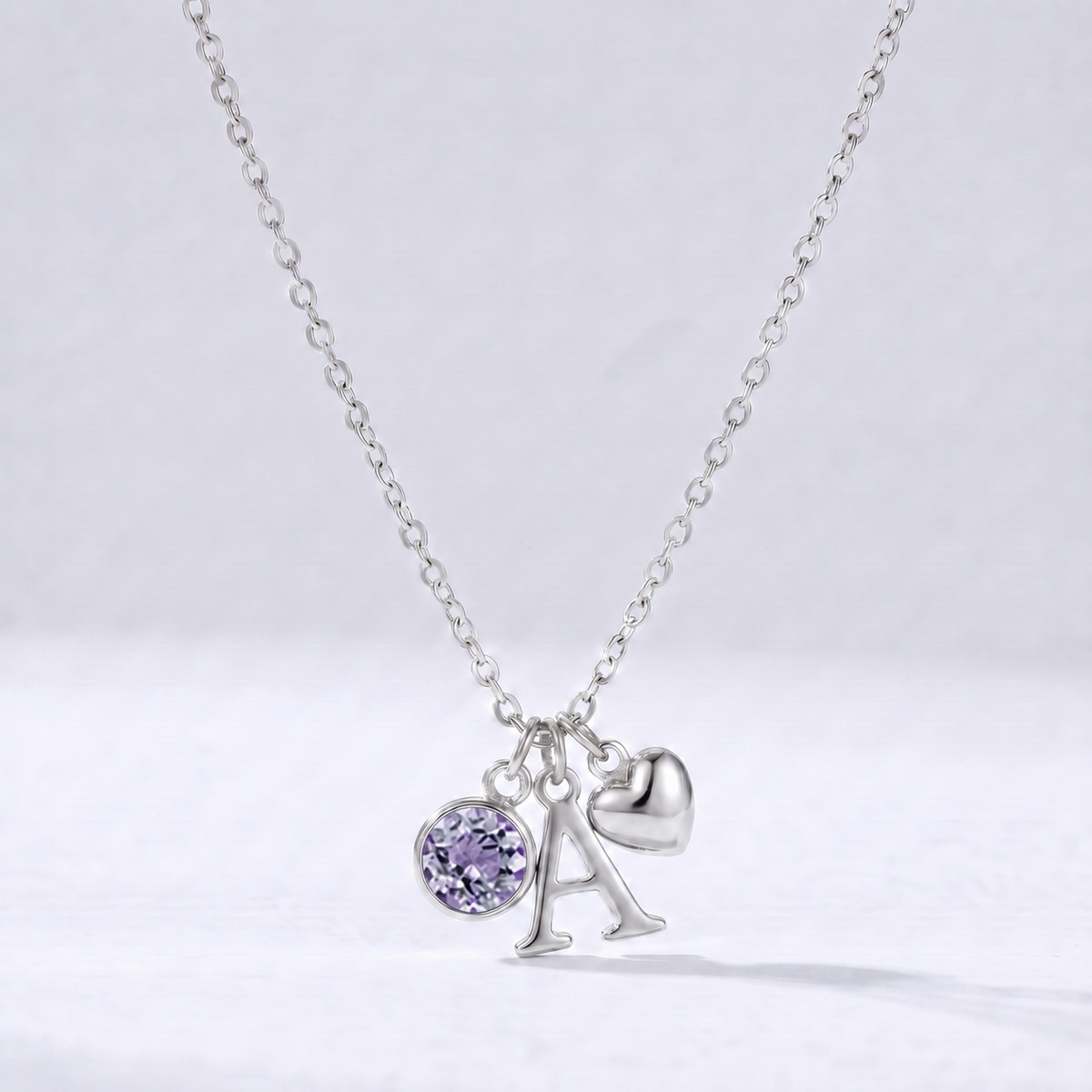 Collar letra A plateado con piedra de nacimiento Junio — Alejandrita y coração