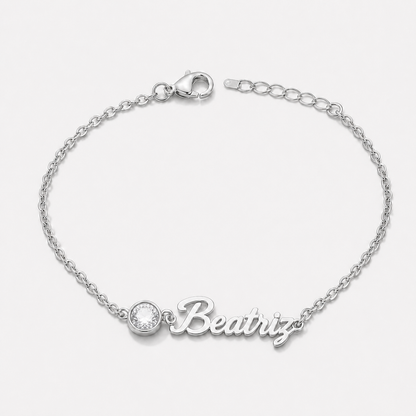 Pulsera con nombre y piedra de nacimiento plateada — Abril — Diamante, nombre Beatriz