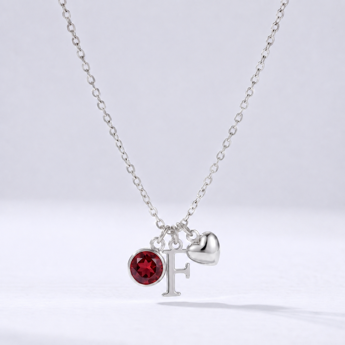 Collar letra F plateado con piedra de nacimiento y coração