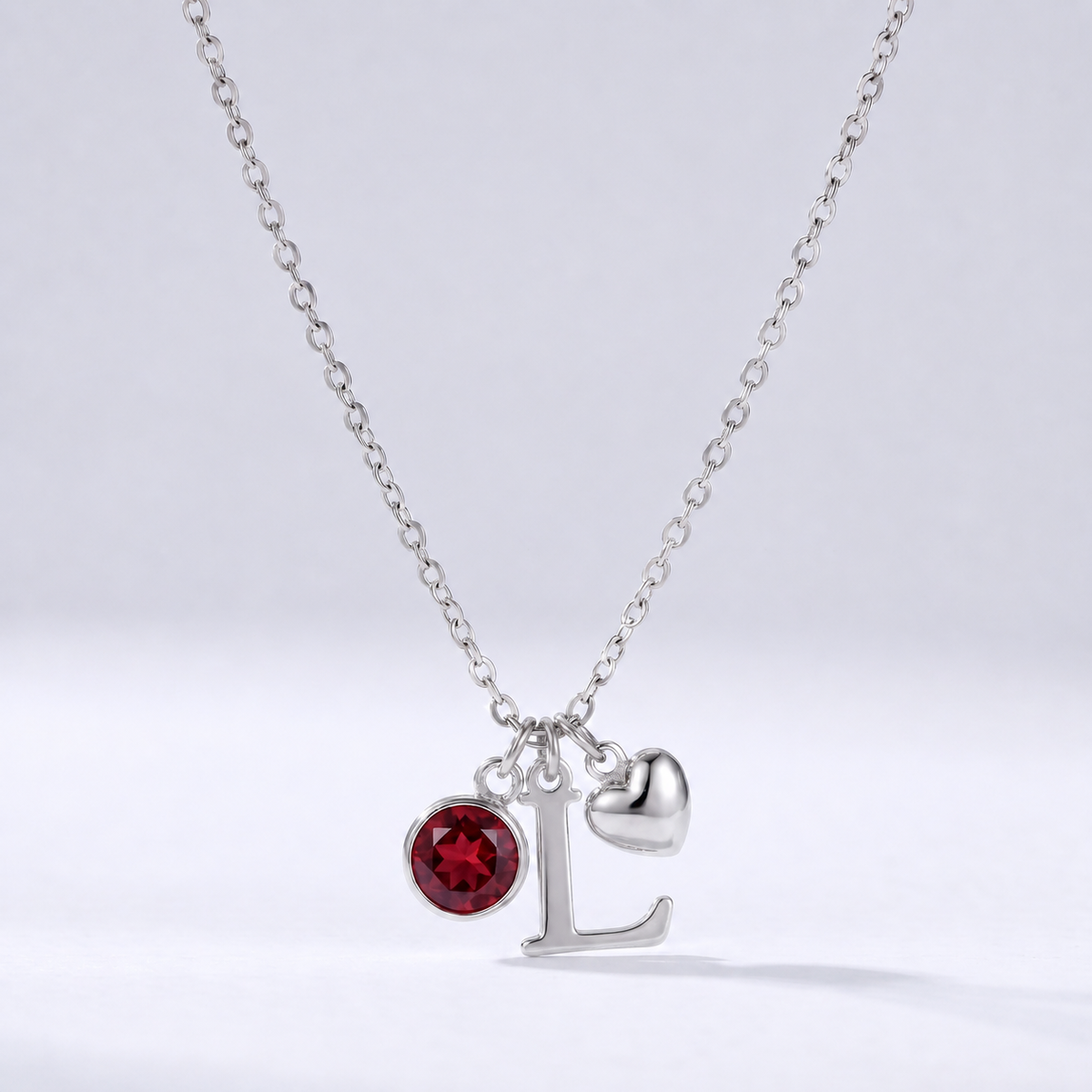 Collar letra L plateado con piedra de nacimiento y coração