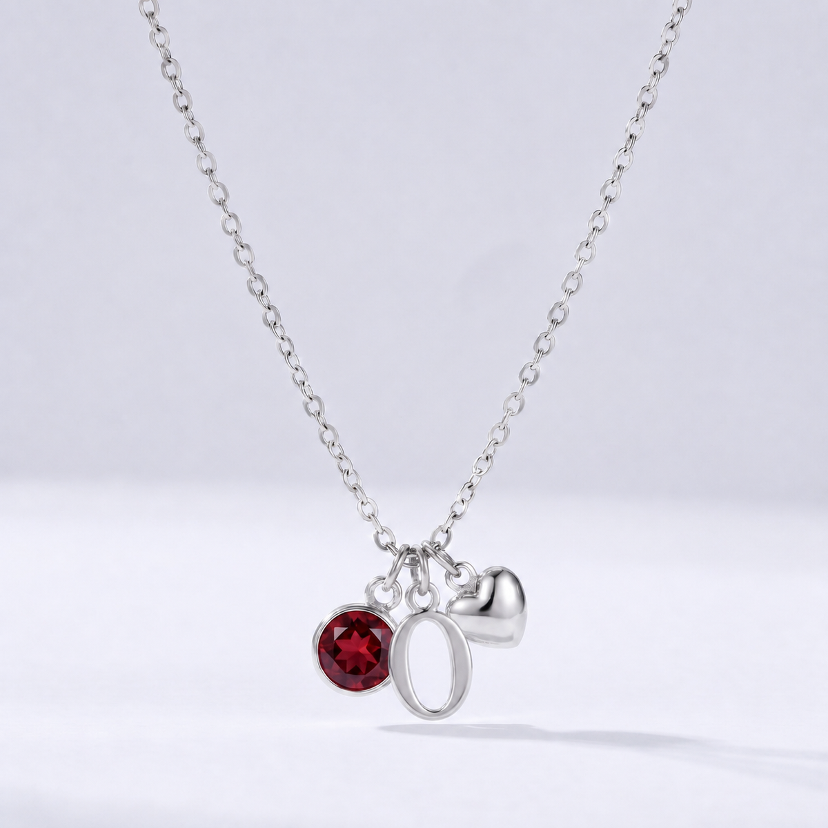 Collar letra O plateado con piedra de nacimiento y coração