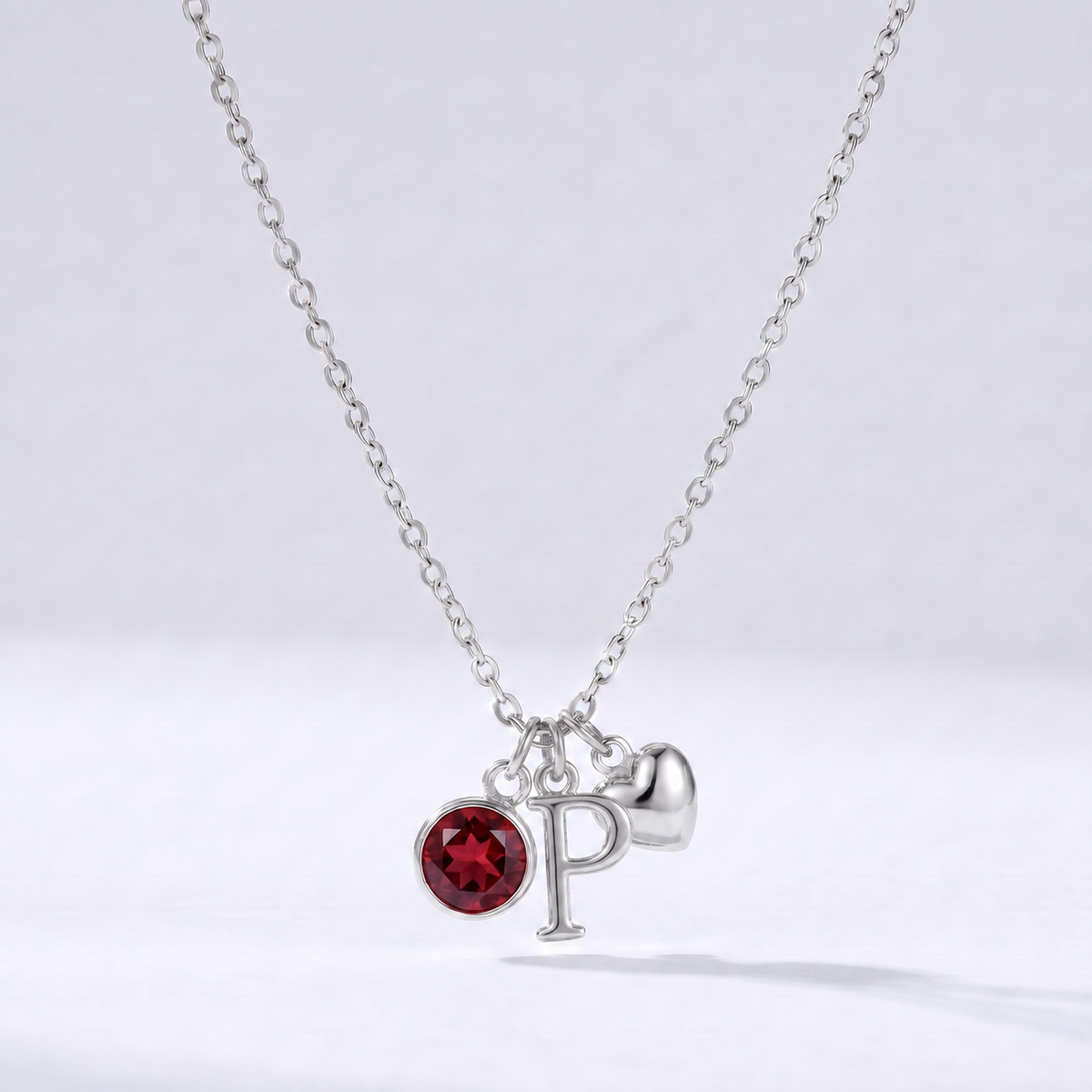 Collar letra P plateado con piedra de nacimiento y coração
