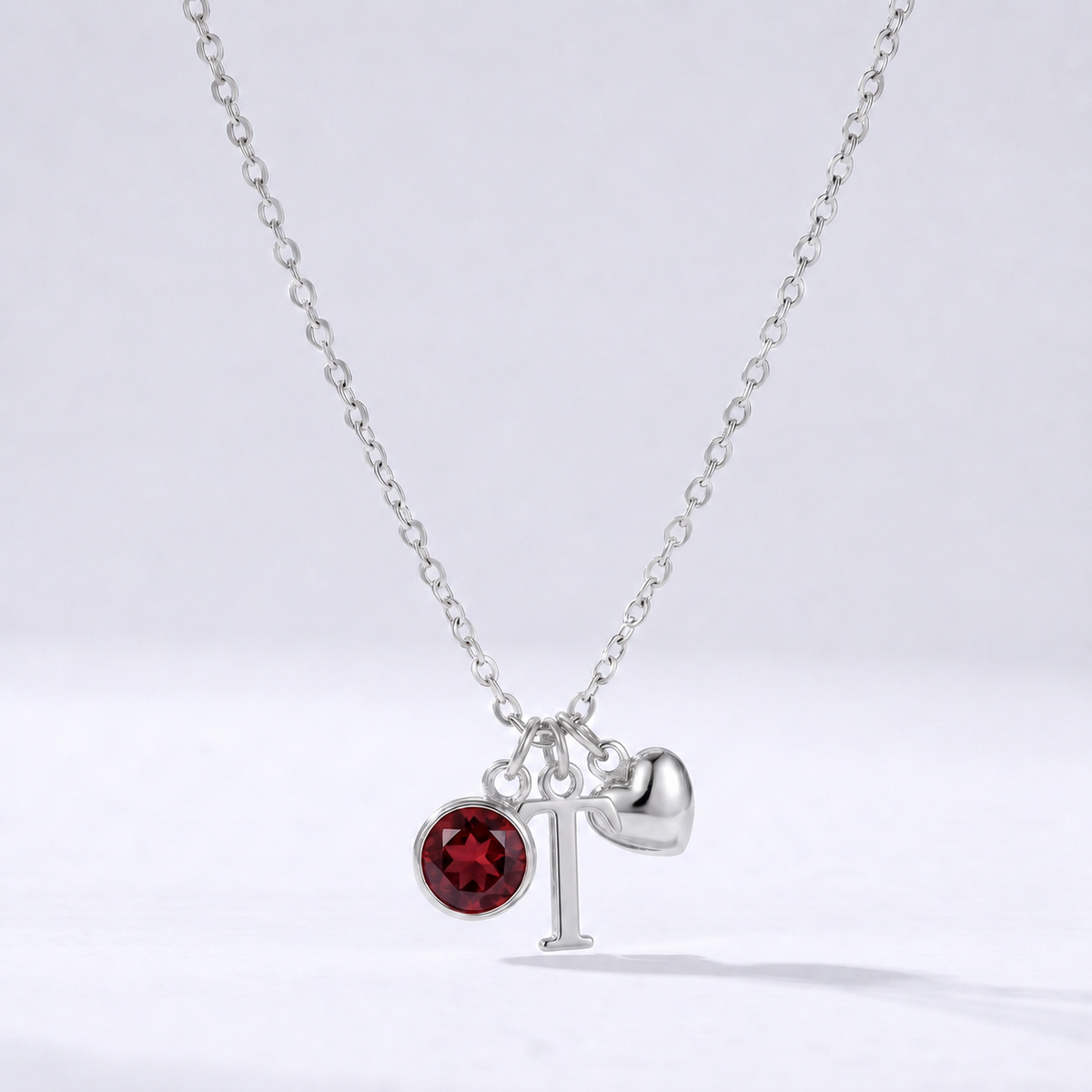 Collar letra T plateado con piedra de nacimiento y coração